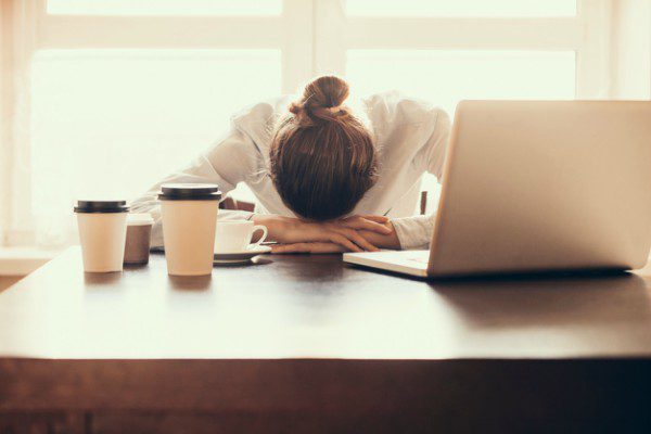 Depressed woman at work